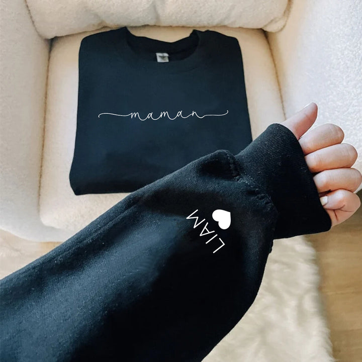 Sweat-shirt Mama personnalisé avec noms d’enfants sur la manche